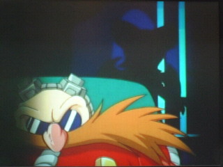 Who's that mysterious figure behind Eggman?