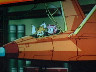 Tails and Amy boarding the Tornado