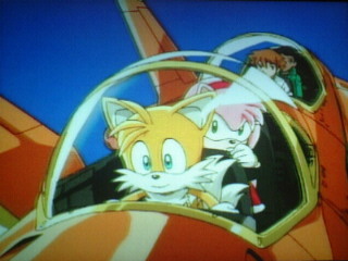 Tails, Amy, Chris and Danny in the air